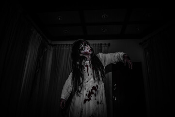 Portrait of asian woman make up ghost,Scary horror scene for background,Halloween festival...