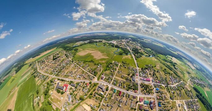 tiny planet in sky with clouds overlooking old town, urban development. Transformation of spherical 360 panorama in abstract aerial view.