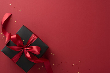 Elevate your Black Friday promotions with this top view exquisite image - black gift box adorned...