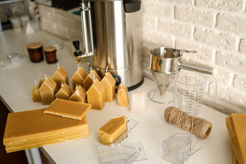 Beeswax candles. Process of making candles in a workshop