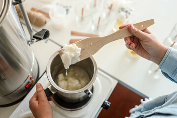 Soy wax melting pot, candle making process