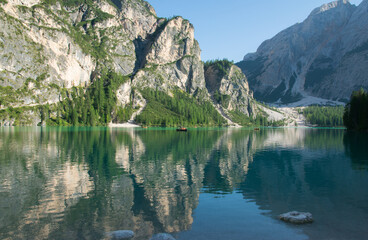 Lake Braies (also known as Pragser Wildsee or Lago di Braies) in Dolomites Mountains, Sudtirol, Italy. Romantic place with typical wooden boats on the alpine lake