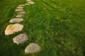 Lethbridge, Alberta, Canada; A Rock Path Through The Grass