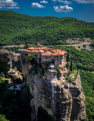 Fototapeta na wymiar METEORA, GREECE - SEPTEMBER 11 2022: incredible sandstone rock formations and monasteries. 