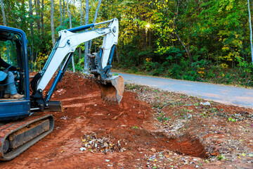 Tractor driven ditch digging for laying drainage concrete sewage a pipe