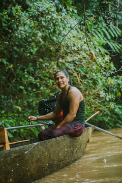 Tribal fisherman sitting on boat