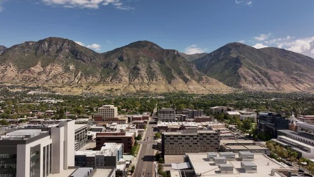 Aerial Provo Utah office business and government building. Aerial Provo Utah downtown business shopping building. Urban city office, buildings business headquarters along street traffic. Neighborhood.