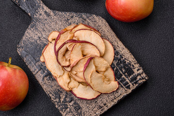 Delicious ripe red apple, sliced and dried in a special dryer