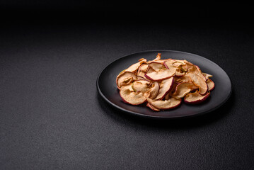 Delicious ripe red apple, sliced and dried in a special dryer