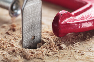 flat or paddle drill bit make holes in wooden oaks plank