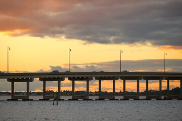 Barron Collier Bridge and Gilchrist Bridge in Florida with moving traffic. Transportation...