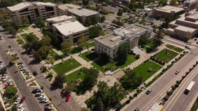 Aerial Provo Utah County and State government buildings. Aerial Provo Utah downtown business shopping building. Urban city office, buildings business headquarters along street traffic. Neighborhood.