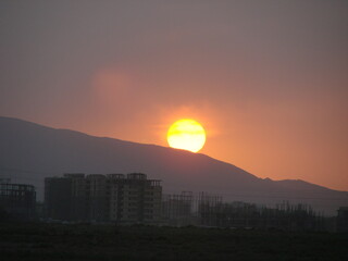 Obraz premium sunset over the city