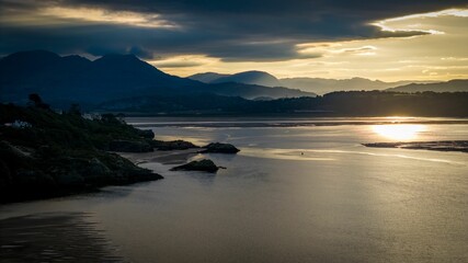 Aerial view of a stunning Sunrise over Morfa Bychan, Wales