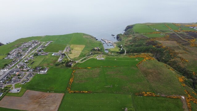 View of stunning green landscape of Lybster, Scotland