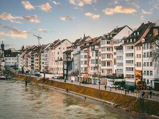 there is an image of houses along the riverbank in germany