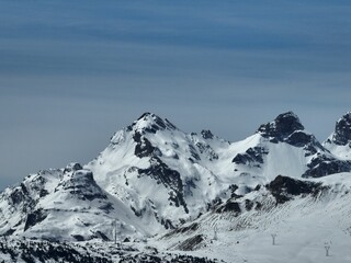 Fototapeta na wymiar Scenic view of a snow-capped mountain range in Swiss Alps in winter