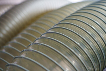 Flexible PUR antistatic suction hose for air conditioning, background flexi hose, industrial ventilation.	