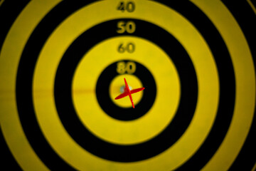 Darts game. Achieve goals. Concept with blur.
