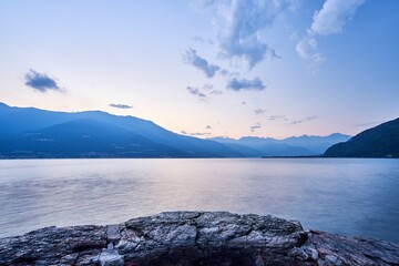 Beautiful shot of a sunset sky over Lake Como and nearby mountains