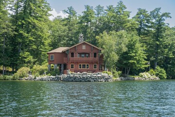 Picturesque lake house in front of the peaceful waters of Lake Winnipesaukee, New Hampshire