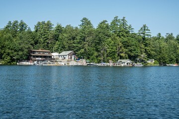 Fototapeta premium Picturesque lake house in front of the peaceful waters of Lake Winnipesaukee, New Hampshire