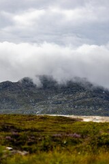 Scenic view of green mountains in Sweden on a cloudy day