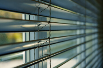Workshop and office metal horizontal blinds line detail on background. - obrazy, fototapety, plakaty
