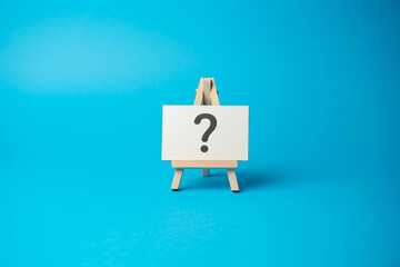 Question mark on the stand. Asking questions and seeking answers. Explore the unknown and seek...