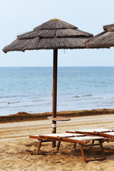 sun umbrella and beach charis