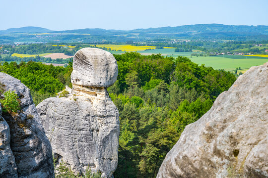 Panoramic view of a sandstone rock city in Bohemian Paradise, Czech: Cesky raj. The Skull, Czech: Lebka, rock tower in Hruba skala rock city town. Czech Republic
