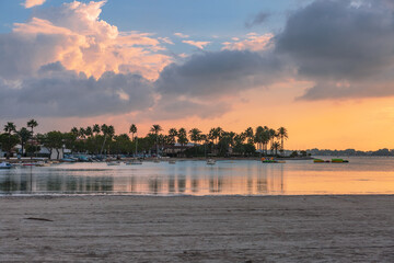 Beach of Alcudia town in sunset time - 650426625