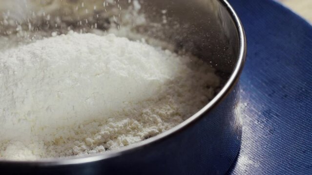 Slow Motion Sprinkle Flour on Plate