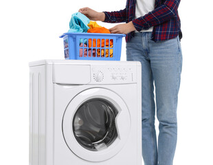 Woman with laundry basket near washing machine on white background, closeup