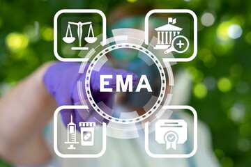 Doctor using virtual touch screen presses abbreviation: EMA. Concept of EMA European Medicines Agency. Department of medicines evaluation, quality control and standards compliance.
