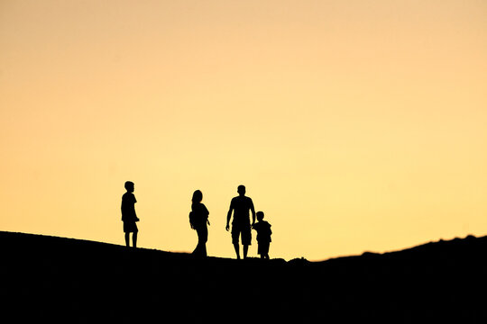 Family at Sunset: A Portrait of Love
