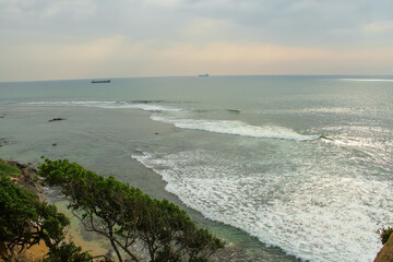 View on the tree and the ocean from the ancient fortress in Galle, Sri Lanka