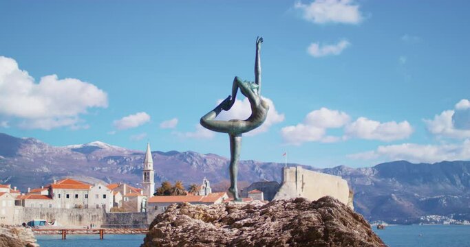 Attraction symbol of budva montenegro dancer old town sea sky resort tourist place. ballerina statue antique historical city beautiful scenery. Architecture nature beach vacation coastal cliffs