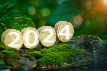 New year concept 2024. Wooden block numbers 2024. Merry Christmas, Happy New Year with holiday celebrations. Starting new business, starting investment plan goals for 2024. nature banner background