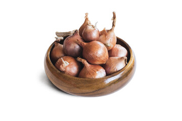 Red onions in wooden bolw  on white background.