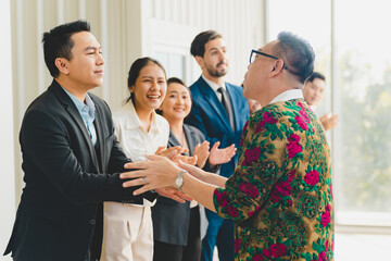 Obraz premium Celebrate and victory to business success with colleagues. Business celebration party event with co-worker partner in business marketing team, winner successful with startup teamwork together
