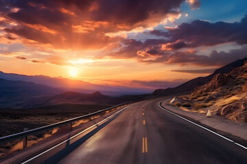 Aerial view of mountain road in orange forest at sunset in autumn. Beautiful landscape with empty highway, hills, pine trees, golden sunlight in fall. Panoramic view of a winding road in the mountains