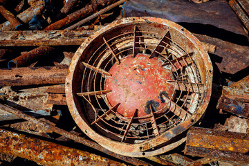 Close-up of a pile of rusty scrap metal. Metal waste for recycling.  Details of old machines and mechanisms.