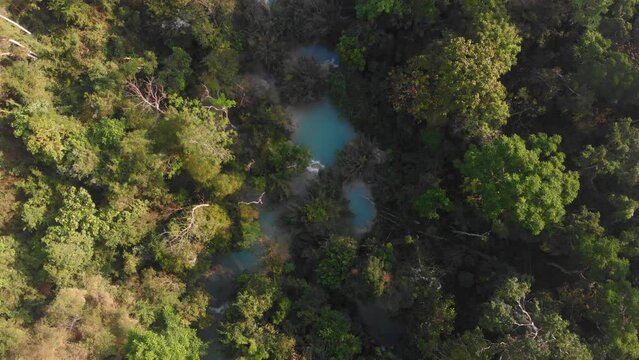 Top down shot of touristy Kuang si falls near luang prabang Loas, aerial