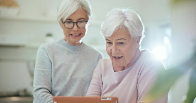 Tablet, social media and senior woman friends browsing the internet while in their home for retirement. Technology, smile and surprise with elderly people using an app for good news or information