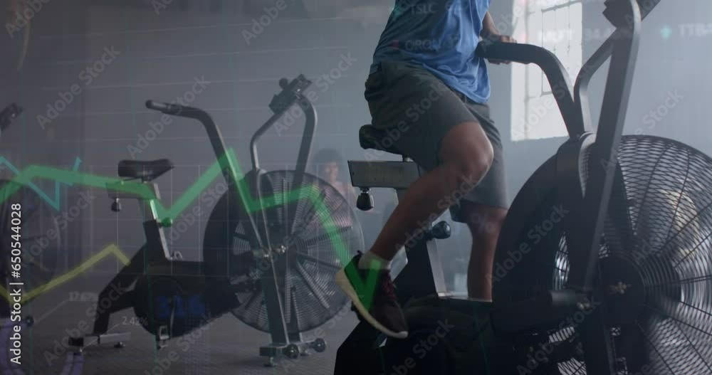 Poster animation of data processing on graph over african american man cross training on elliptical at gym