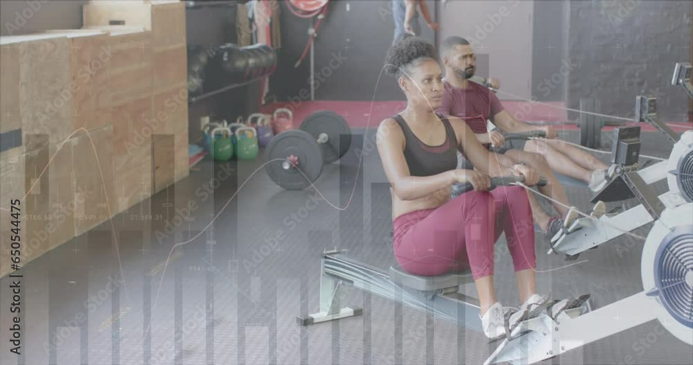 Poster animation of data processing on graph over diverse woman and men training on rowing machines at gym