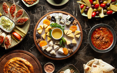 Assortment of cheeses, olives, Turkish snacks. Turkish breakfast