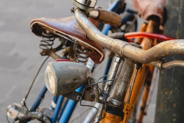Foto auf Acrylglas Old rusty bicycle on the street © Dmitri Krasovski