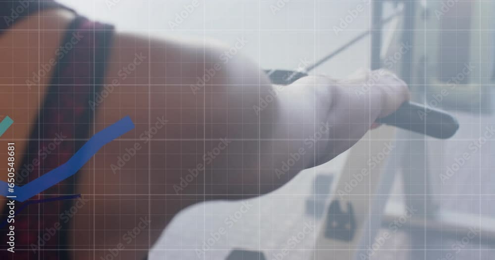 Aufkleber animation of graph processing data over midsection of biracial woman using rowing machine at gym